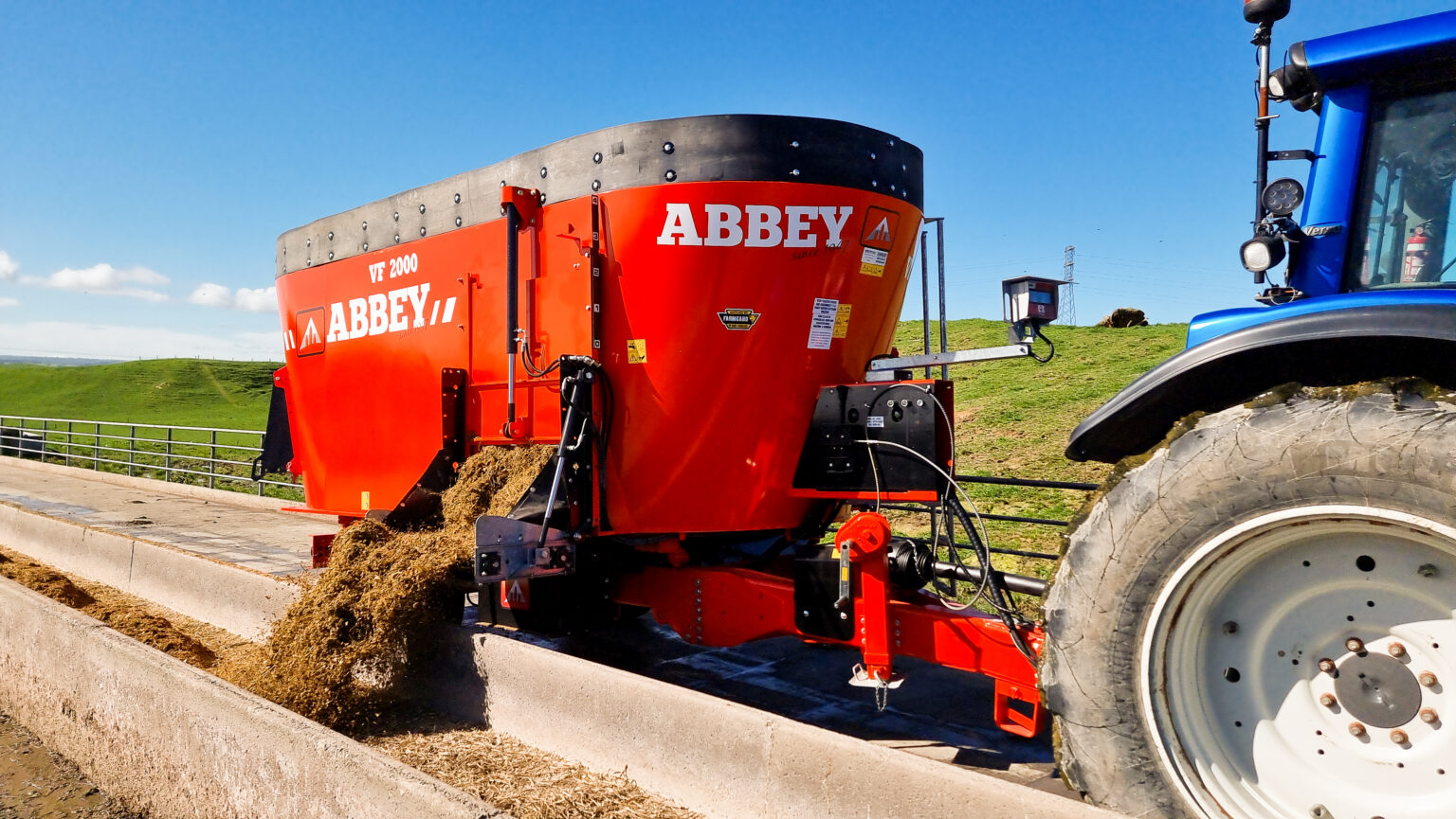 Abbey VF2000 twin auger mixer wagon in action on a New Zealand dairy farm